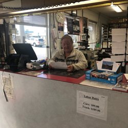 Ernie Lee's Service Center - Theresa working hard to provide excellent customer service