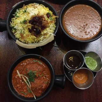 Dishoom - chicken ruby, house black daal, and the Dishoom take on the legendary Irani Café special chicken berry biryani with cranberries. - Indian Near Me - London, XGL Dishoom - chicken ruby, house black daal, and the Dishoom take on the legendary Irani Café special chicken berry biryani with cranberries. - Indian Near Me - London, XGL