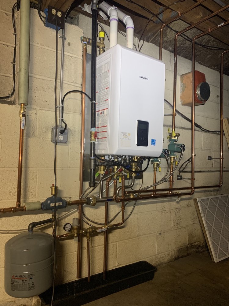 Slide of Service Tech Plumbing Heating &Cooling