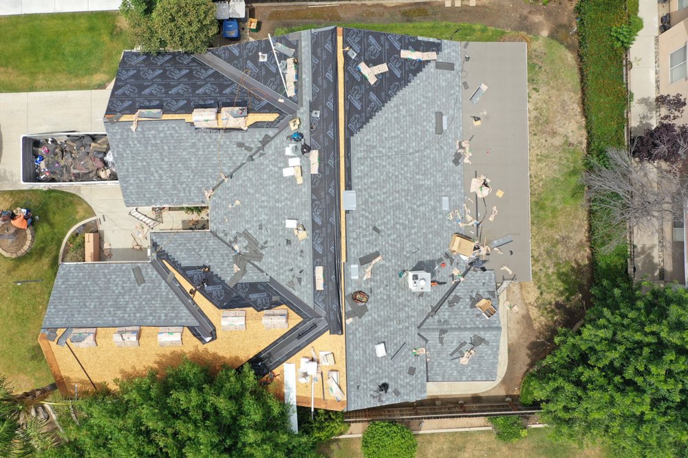 Slide of Roof Pros Roofing