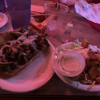 Lighthouse Bar & Grill - Philly with salad - Sports Bars Near Me - Omaha, Nebraska