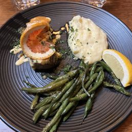 $50 tiny piece of fish with a tiny amount of potatoes. Horrible presentation.