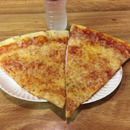 Two large, tasty plain slices. Water bottle for size comparison. Two large, tasty plain slices. Water bottle for size comparison.