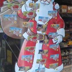Tabakwaren Lotto Beckmann - Weihnachtsmann mit Rubbellosen.