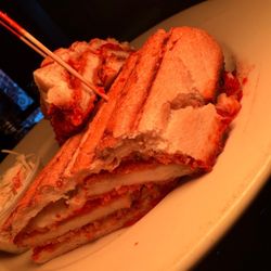 Stephen's Green - Chicken Parm Hero -- crispy chicken cutlet with house tomato sauce and melted mozzarella on a toasted garlic wedge.