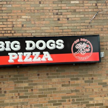 Big Dog's Pizza - a sign on the side of a brick building - Pizza Near Me - Mason, Ohio