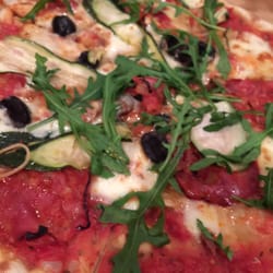 Pizzarova - Goats Cheese, Chorizo, Black Olives and Courgette with some rocket on top! Delicious and so much topping!