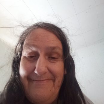 ALDI - a woman with long black hair smiling - Grocery Near Me - Hueytown, Alabama