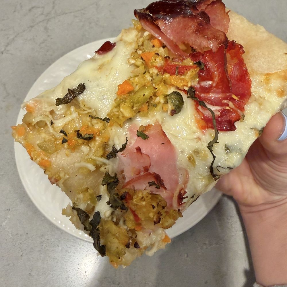 The Deli - Sicilian style pizza with muffuletta toppings. Not on their printed menu, so ask for it. Seriously THE BEST slice! - Sandwiches Near Me - East Aurora, New York The Deli - Sicilian style pizza with muffuletta toppings. Not on their printed menu, so ask for it. Seriously THE BEST slice! - Sandwiches Near Me - East Aurora, New York