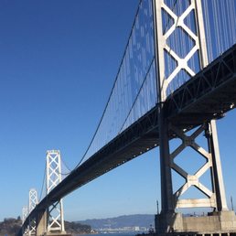 This little sailboat by the mighty Oakland Bay Bridge ! This little sailboat by the mighty Oakland Bay Bridge !