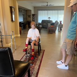 Atlas Therapy Now - Brandon watching her pedal to strengthen her legs.