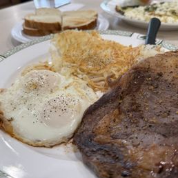 Steak and eggs. Ordered basted with runny yolks. Yolks hard and no run and steak was ordered rare and came well done Steak and eggs. Ordered basted with runny yolks. Yolks hard and no run and steak was ordered rare and came well done
