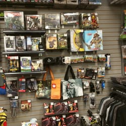 Gamestop - Cool collection of gaming swag for sale.