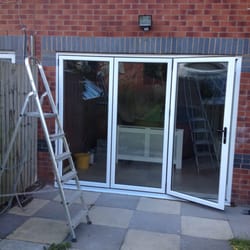 Star Windows - Aluminium white powder coated bi-fold door. Looks great!