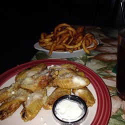Cassadaga Country Club - Garlic Parmesan wings and seasoned curly fries.