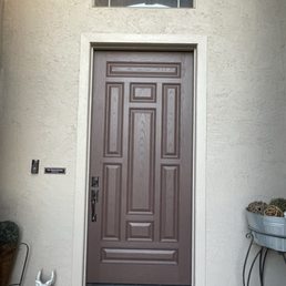 Fresh coat on front door & even polished the door handle!