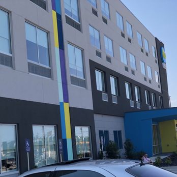 Tru by Hilton Meridian - Side view, very colorful and modern exterior. - Hotels Near Me - Meridian, Mississippi