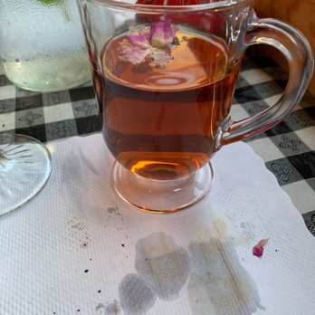 Caspian Restaurant - Persian rose tea with small rose bud! (And dirty placemat cuz I'm messy.) - Mediterranean Near Me - Mountain View, California Caspian Restaurant - Persian rose tea with small rose bud! (And dirty placemat cuz I'm messy.) - Mediterranean Near Me - Mountain View, California