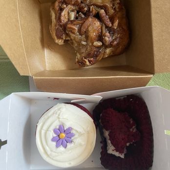 Dots Cafe - Cinnamon roll with nuts Two red velvet cupcakes, one is half eaten - Cafes Near Me - Pasadena, California