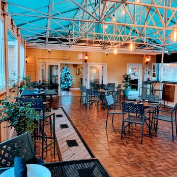 Cafe Pamlico - Enclosed dinning room with fireplace - Seafood Near Me - Buxton, North Carolina Cafe Pamlico - Enclosed dinning room with fireplace - Seafood Near Me - Buxton, North Carolina