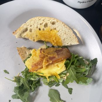MoonGoat Coffee Roasters - Egg/Bacon Bagel Sandwich. One piece of bacon for the whole sandwich. Very dry. - Coffee Roasteries Near Me - Costa Mesa, California MoonGoat Coffee Roasters - Egg/Bacon Bagel Sandwich. One piece of bacon for the whole sandwich. Very dry. - Coffee Roasteries Near Me - Costa Mesa, California