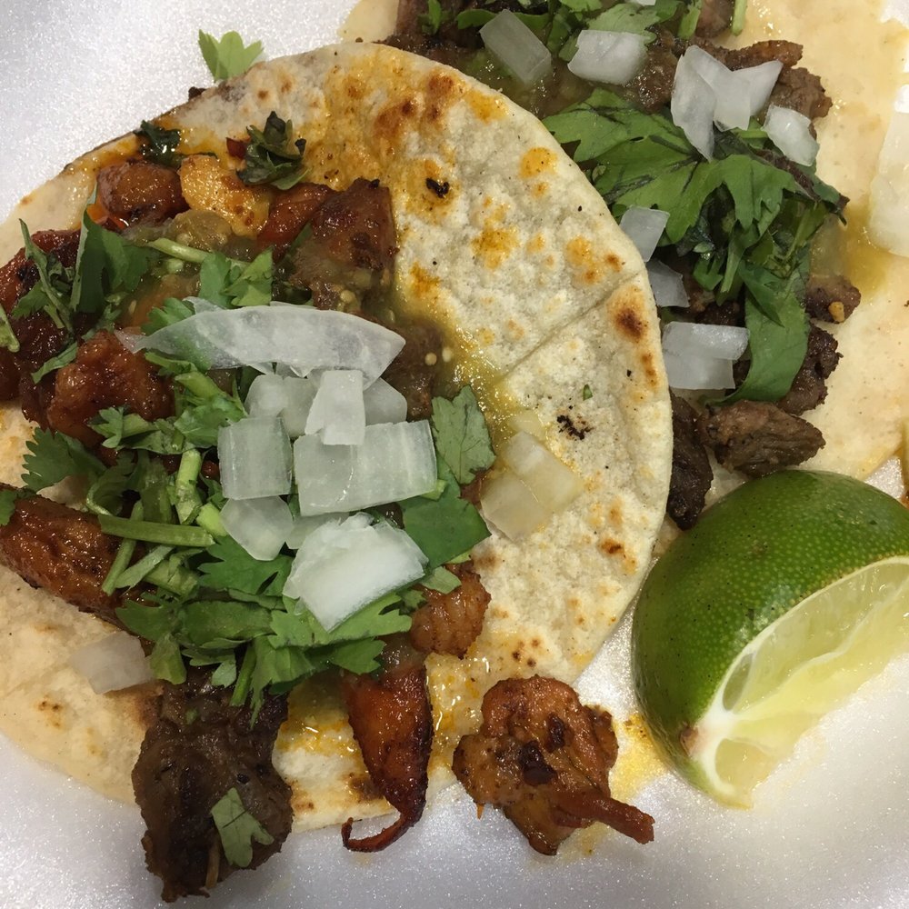 Tacos El Primo - two tacoss on a plate - Food Trucks Near Me Tacos El Primo - two tacoss on a plate - Food Trucks Near Me