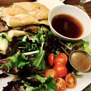 Cascades Restaurant & Bar - Smoked prime rib dip with salad - American Near Me - Bellevue, Washington