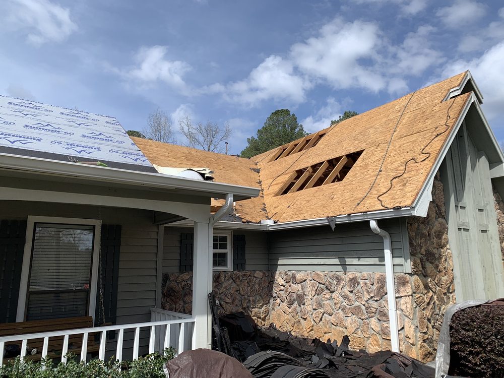 Slide of Martin Roofing