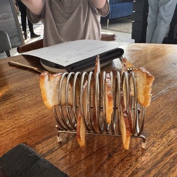 The Lobbyist - Crostini's that go with the meat and cheese board shown - Bars Near Me - Memphis, Tennessee