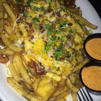 Fronk's - Cheddar bacon cheese fries with green onions and chipotle sauce. Amazing! - Burgers Near Me - Bellflower, California