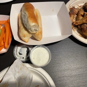 Epic Wings - Lemon pepper chicken wings, breadsticks, dipping sauce, celery, and carrots. - Chicken Wings Near Me - Mission Viejo, California Epic Wings - Lemon pepper chicken wings, breadsticks, dipping sauce, celery, and carrots. - Chicken Wings Near Me - Mission Viejo, California