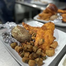 Freedom Chophouse - Fried catfish filet, baked potato, fried okra.