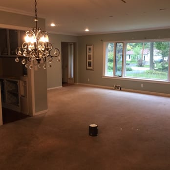 BD Hardwood Floors - Before photo, living room.  Stained ugly carpeting. - Flooring Near Me