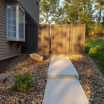 Fleming Contracting - Entry way of composite fence. Steve worked with my landscaper and the concrete contractor to create this amazing entryway to my patio. - Roofing Near Me - New Kensington , Pennsylvania Fleming Contracting - Entry way of composite fence. Steve worked with my landscaper and the concrete contractor to create this amazing entryway to my patio. - Roofing Near Me - New Kensington , Pennsylvania