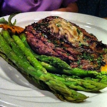 Kurt's Euro Bistro - Ribeye with a side of asparagus - Modern European Near Me - Duluth, Georgia Kurt's Euro Bistro - Ribeye with a side of asparagus - Modern European Near Me - Duluth, Georgia