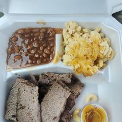 Chewy brisket with some disgusting mustard sauce, bland mac and cheese, beans were decent, way over priced was $30 for the small portion.
