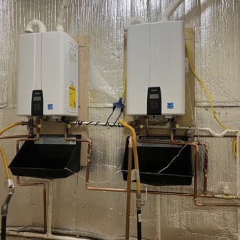 Bow Tie Plumbing - Two Navien 240 A Gas Powered Tankless Water Heaters 2024 - Plumbing Near Me - Mansfield, Texas