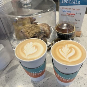 New Order Coffee Roasters - Two lattes with lovely designs! - Coffee & Tea Near Me - St. Clair Shores, Michigan