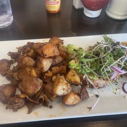 Avocado toast and potatoes, potatoes were nice also, crispy Avocado toast and potatoes, potatoes were nice also, crispy