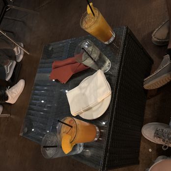 Casablanca - a table with drinks and napkins on it - Middle Eastern Near Me - Milwaukee, Wisconsin