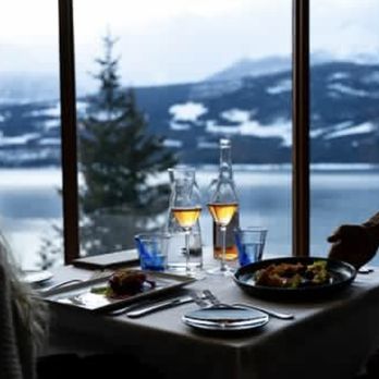 Alcédo Kitchen & Bar - a man serving a meal to a woman - Breakfast & Brunch Near Me - Nakusp, British Columbia