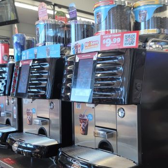 Circle K - a row of coffee machines in a store - Gas Stations Near Me - Scottsdale, Arizona