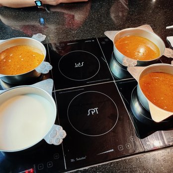 Jazz Cat Restaurant - 4 Satay Soup Base and 1 milk soup base good enough for 6 adults and 3 kids. - Asian Fusion Near Me - Arcadia, California