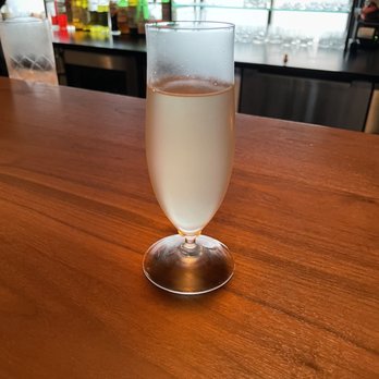 Oriole - Corn husk, Yuzu, verjus, tonic. First of four courses served at the bar when you first arrive - New American Near Me - Chicago, Illinois