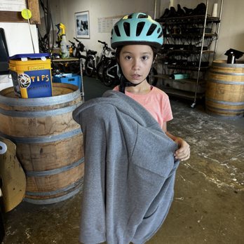 Big Sur Adventures - My nice what a hoodie the guys let her use. - Bike Rentals Near Me - Pacific Grove, California
