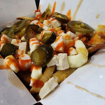 Smokes Poutinerie - Chicken inferno poutine - Poutineries Near Me - Moncton, New Brunswick Smokes Poutinerie - Chicken inferno poutine - Poutineries Near Me - Moncton, New Brunswick