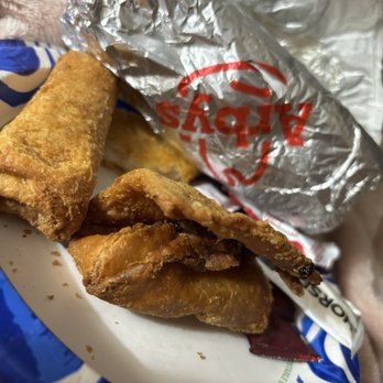 Arby's - Very terrible "opened" peach dessert eggroll that they know they should have never served us... next to a normal eggroll. - Fast Food Near Me - Palm Bay, Florida Arby's - Very terrible "opened" peach dessert eggroll that they know they should have never served us... next to a normal eggroll. - Fast Food Near Me - Palm Bay, Florida