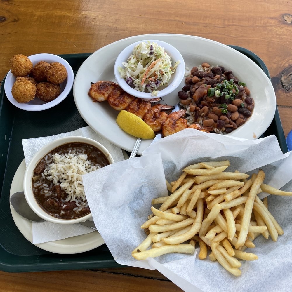 Flying Fish - BBQ shrimp kebabs + hush puppies + gumbo + fries - Seafood Near Me - Coppell, Texas Flying Fish - BBQ shrimp kebabs + hush puppies + gumbo + fries - Seafood Near Me - Coppell, Texas