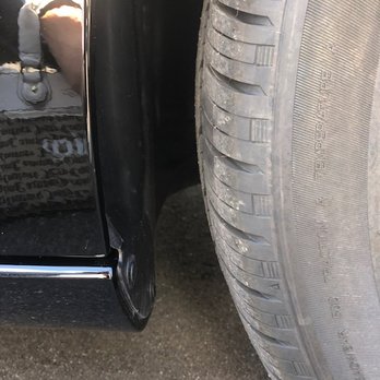 Crown Collision Center - The affected side. Notice the space between tire and fender. - Body Shops Near Me - Saint Petersburg, Florida Crown Collision Center - The affected side. Notice the space between tire and fender. - Body Shops Near Me - Saint Petersburg, Florida
