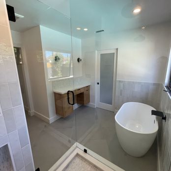 RS Construction - a bathroom with a large bathtub - General Contractors Near Me RS Construction - a bathroom with a large bathtub - General Contractors Near Me